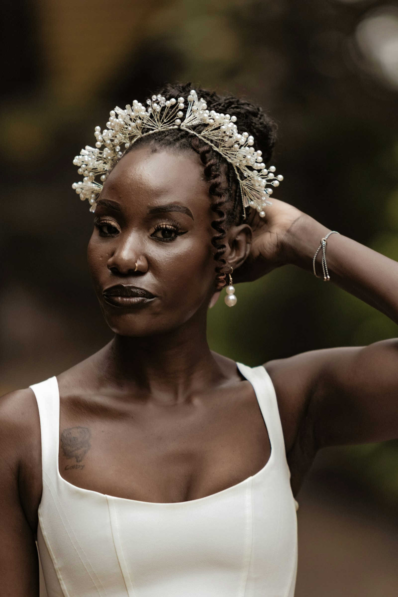 Pearl crown worn across the brow