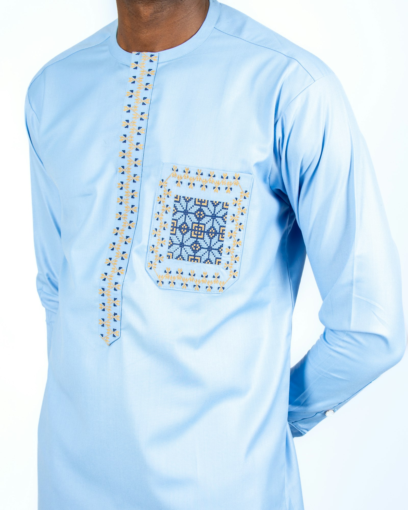 Pale blue kaftan pocket, close up