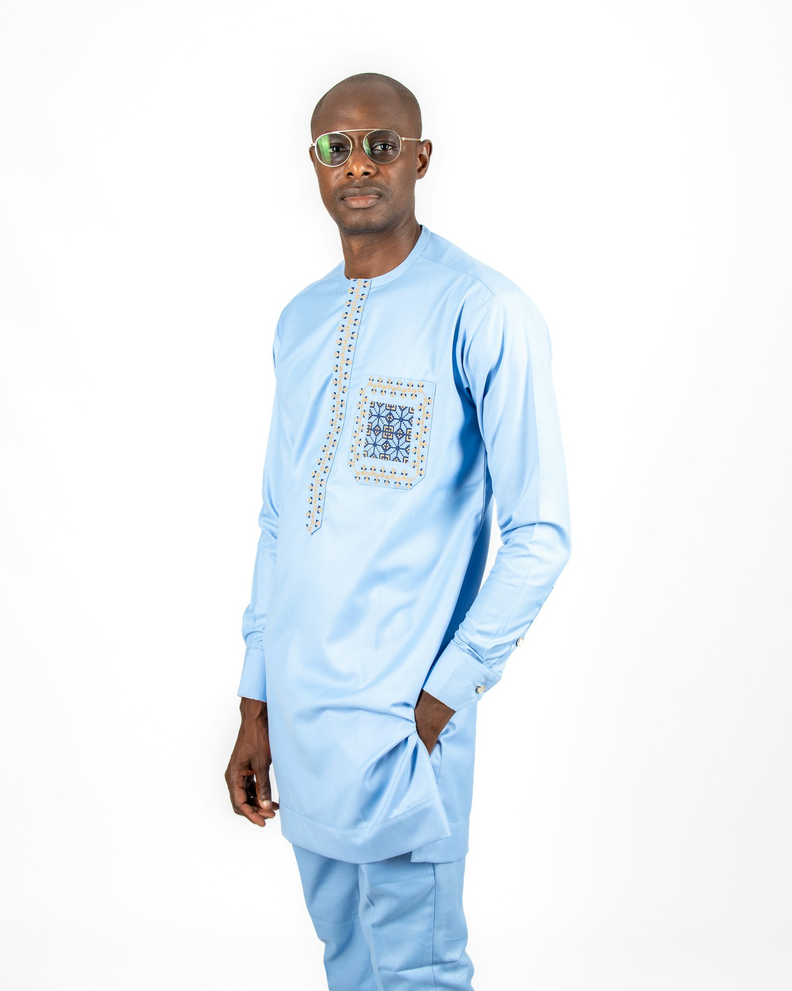 Pale blue kaftan, patch pocket