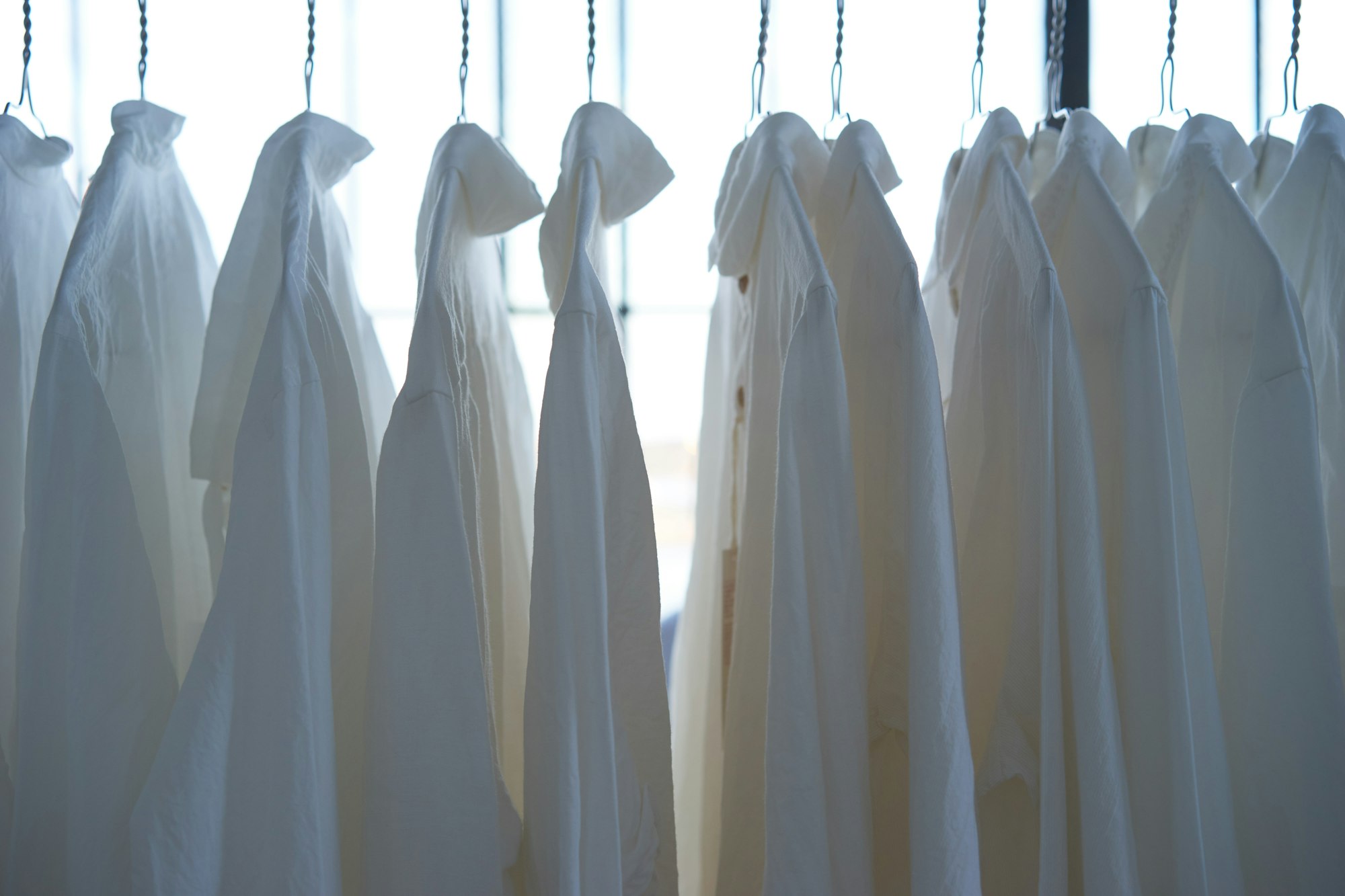 White shirts on hangers